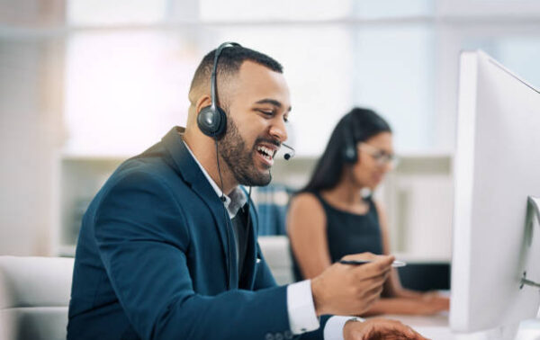 Shot of call centre agents working in an office Shot of call centre agents working in an office